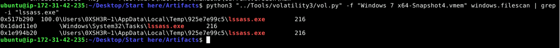 Volatility3 windows.filescan grep for lssass.exe showing three results: the primary binary in AppData\Local\Temp\925e7e99c5, a copy in \Windows\System32\Tasks\, and another reference in Temp.